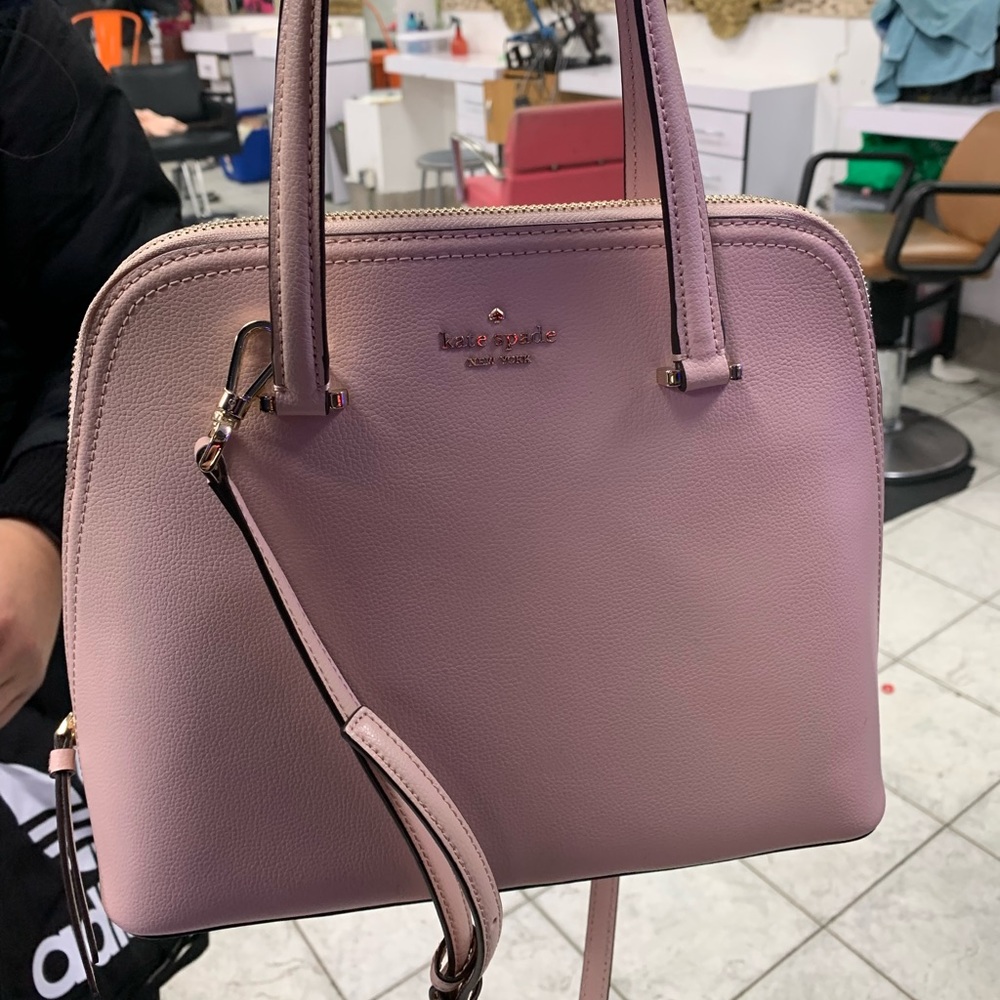 Beautiful baby pink kate spade pure brand new will work with price